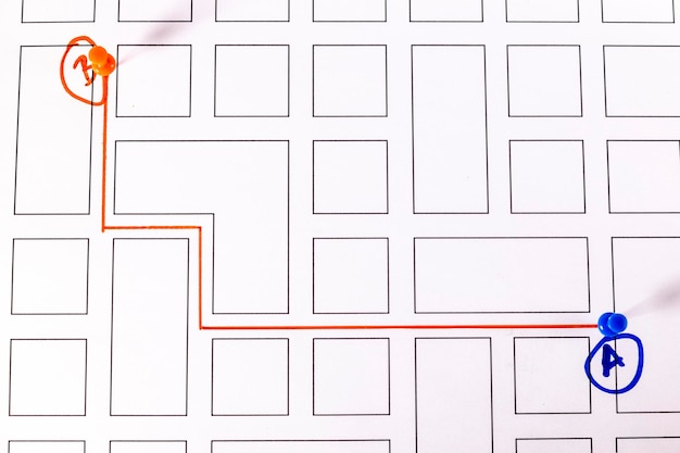 A close-up shot of a tactile map showing accessible routes in a public park, designed to aid visually impaired tourists in navigating the area independently.