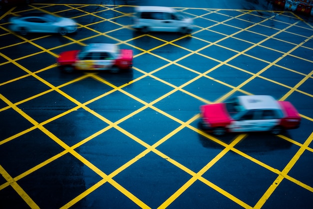 A variety of car logos from different rental companies (Hertz, Avis, Localiza, etc.) displayed in a grid format, representing choice and comparison.
