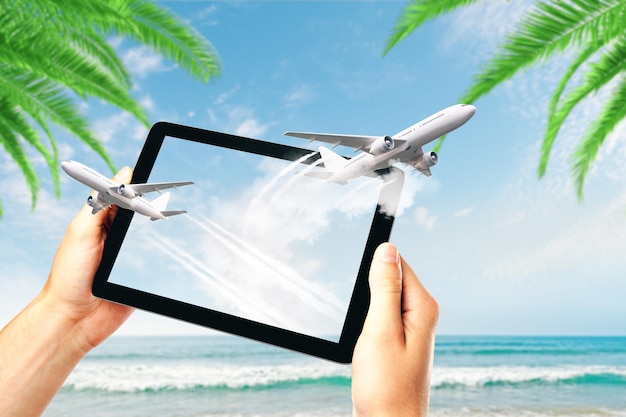A tablet displaying a travel booking app comparing flight prices for various airlines to a tropical destination. Emphasis on the user interface showing price trends and alerts for price drops.