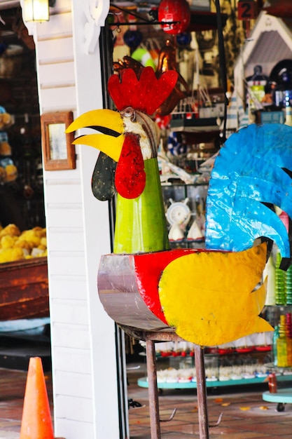 A vibrant street market in Salvador, Bahia, Brazil, filled with colorful handicrafts, local food stalls, and tourists exploring the cultural richness of the area.