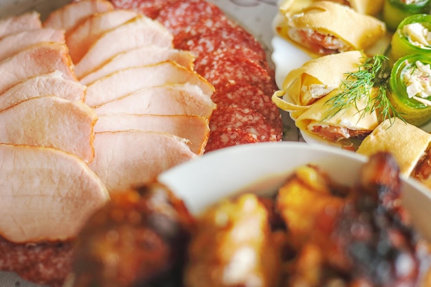 A close-up shot of various cuts of salted and smoked meats being arranged on a wooden cutting board, ready to be used in feijoada. Include meats like dried beef, paio, and bacon. The lighting is natural and focuses on the textures of the meats.