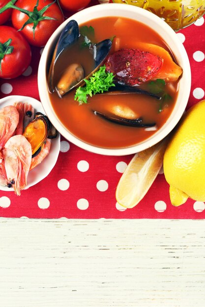 A split image showing side-by-side comparisons of traditional feijoada and moqueca ingredients with their budget-friendly alternatives, emphasizing the price difference and maintaining visual appeal. The ingredients are neatly arranged to highlight key substitutions.