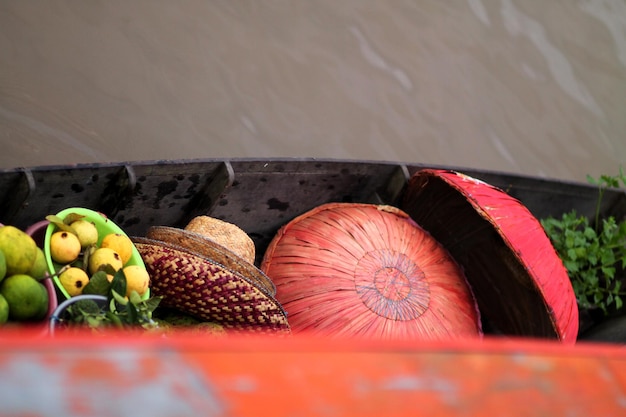 A close-up, detailed shot of a vibrant array of fresh ingredients for Brazilian cuisine, including ripe tomatoes, green bell peppers, cilantro, lime, and garlic cloves neatly arranged on a wooden cutting board.