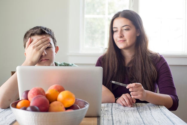 A worried mother closely examines grocery prices, emphasizing the difficult financial choices families are forced to make due to inflation, affecting budgeting.