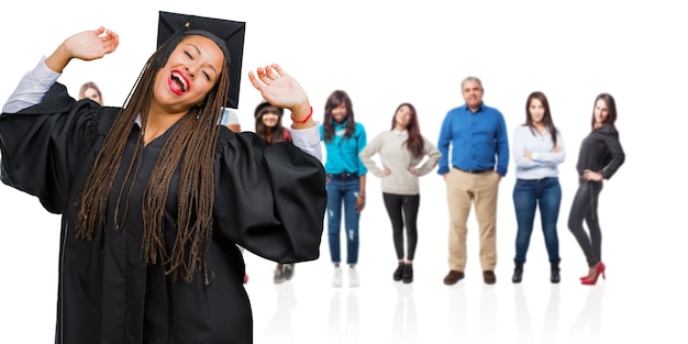 An image of a diverse group of students celebrating their graduation, symbolizing the achievement of higher education.
