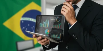 Empresário brasileiro analisando gráficos financeiros e legislação tributária em tablet, representando o impacto da nova lei de incentivo fiscal de 2025.