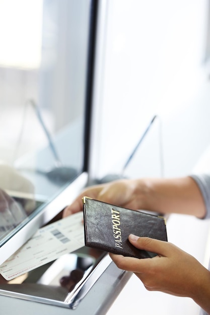 A close-up shot of a traveler securely storing digital copies of their important documents (passport, ID, travel insurance) on a password-protected smartphone app, emphasizing the importance of digital backup for travel security.